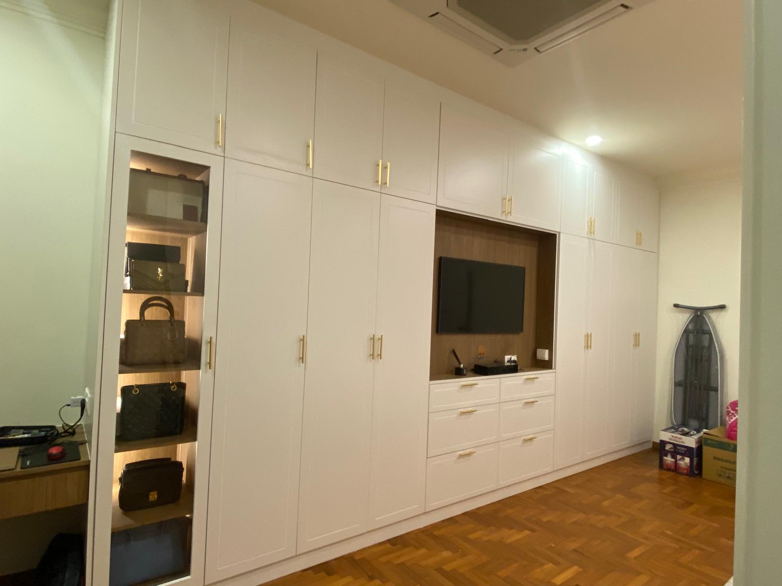 Walk-in wardrobe with illuminated display shelving